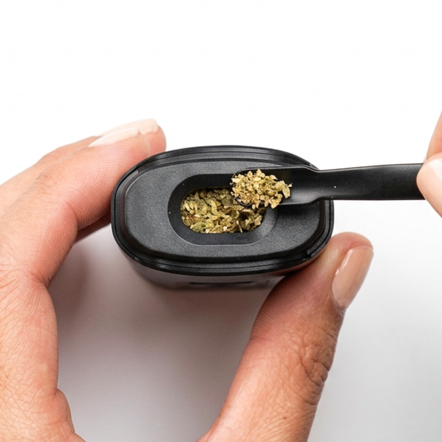 Loading the G Pen Dash+ herb chamber